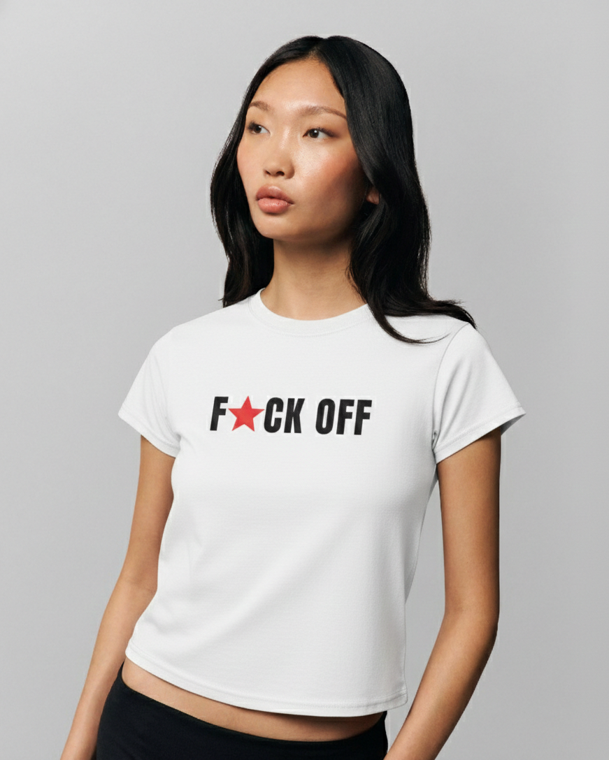 Person wearing a white t-shirt with a graphic design on a gray background